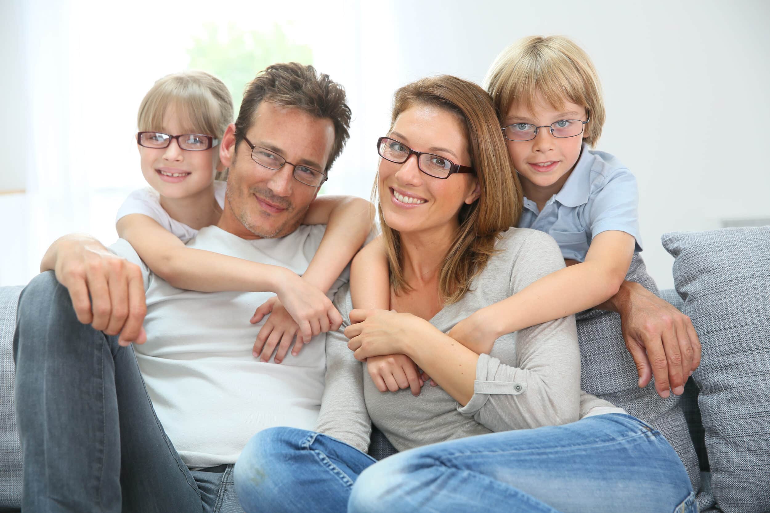 Portrait,Of,Happy,Family,Of,Four,Wearing,Eyeglasses Eye Health Services Dallas TX